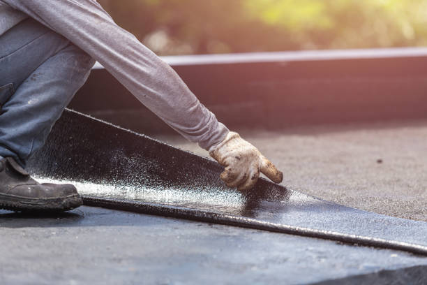 Professional Basement Waterproofing technician working in Wyandotte, MI